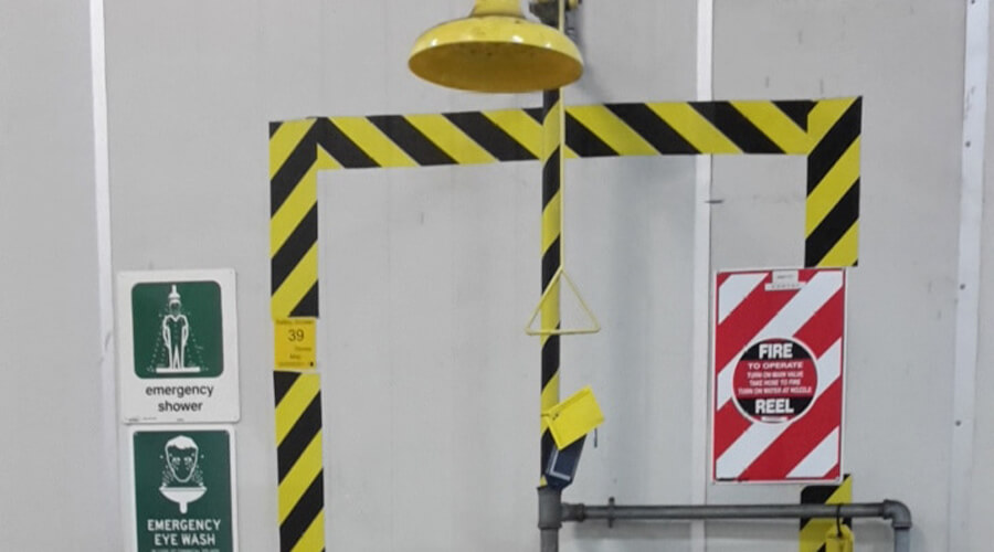 Safety shower sign and tape installation plus tap repair